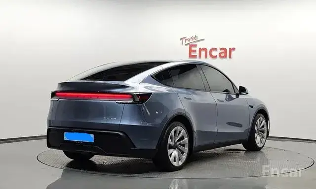 Tesla Model Y 2025 — фото 1 из 5