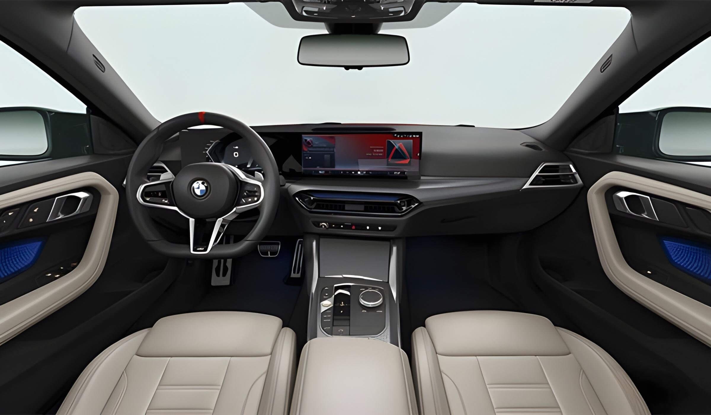 Салон BMW 2 Series Gran Coupe 2025 с цифровым экраном и кожаной отделкой.