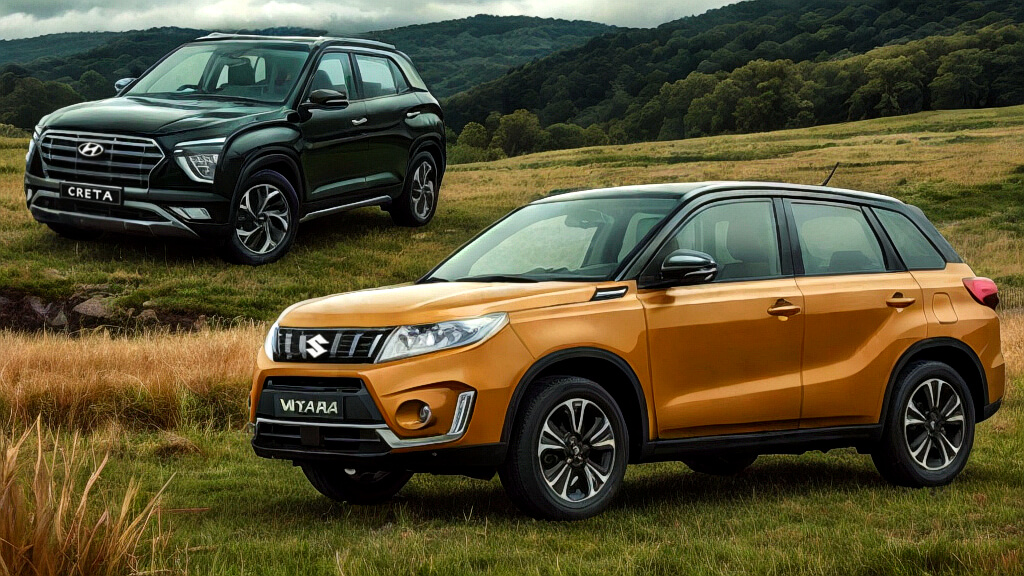 Оранжевый Suzuki Vitara и черный Hyundai Creta стоят на травяном поле с горами на фоне.